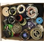 A box of assorted fly fishing reels to include a Courtland "Endurance Mark II" salmon fly reel, an