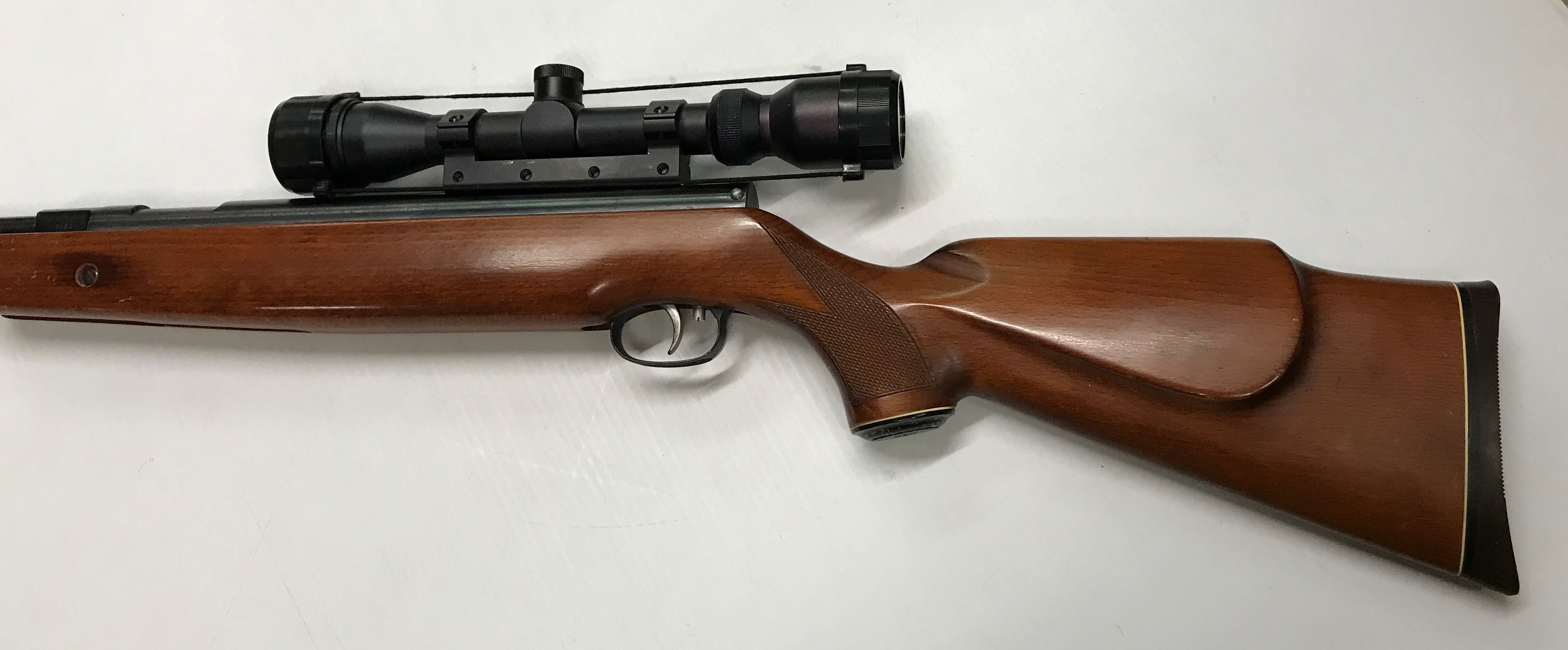 A Weihrauch HW77K .22 air rifle (No. 1018305), together with Tasco 7 x 32 telescopic sight, together