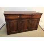 A modern cherry wood sideboard in the 19th Century