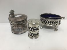 A late 20th Century three piece cruet comprising a silver drum mustard, pepper and oval salt with