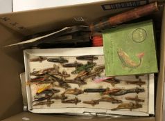 A collection of assorted fishing tackle to include three old japanned fly fishing cases and lure