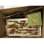 A collection of assorted fishing tackle to include three old japanned fly fishing cases and lure