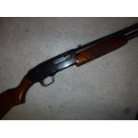 A Mossberg 500A 12 bore shotgun, pump action, together with a Birmingham Gun Barrel Proof House