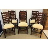 A modern set of six ladder back dining chairs with upholstered seats (4 plus 2), the carvers 108