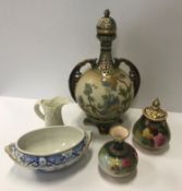 A collection of Royal Worcester comprising a squat vase with floral decoration on a green and yellow