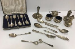 A collection of silver wares including a cased set of six silver teaspoons (by James Dixon & Son,