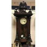 A circa 1900 walnut cased Vienna regulator wall cl