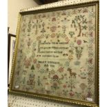 An early 19th Century sampler depicting floral motifs, buildings, ships, flowers, etc, and inscribed