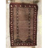 A Turkamen prayer rug, the central panel set with