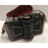 A Panon Widelux F7 Panoramic camera, No'd. 348085, housed in brown leather caseCondition