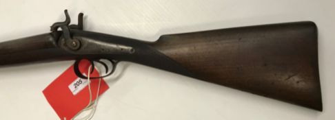 A 19th Century Thomas Naylor of Sheffield double barrel shotgun, side by side, hammer action, muzzle