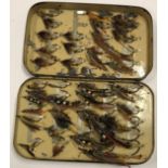 A large patent registered japanned salmon fly fisher's case with two internal swing leaves,