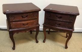 Two pairs of modern Chinese hardwood two drawer bedside chests of serpentine form, raised on