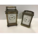 A brass five glass carriage clock, the enamel dial set with Roman numerals, 15.5 cm high including