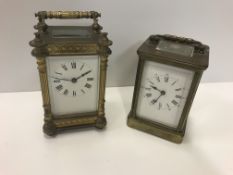 A brass five glass carriage clock, the enamel dial set with Roman numerals, 15.5 cm high including