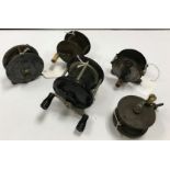 A collection of five vintage fishing reels to include a W. Garnett & Son of Dublin 2¾" diameter