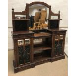 A Victorian walnut and inlaid side cabinet with mirrored superstructure over central open shelving