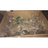Eight boxes of assorted glassware to include wines, fruit bowls, cake stands, etc and a box of