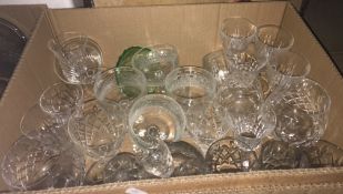 Eight boxes of assorted glassware to include wines, fruit bowls, cake stands, etc and a box of