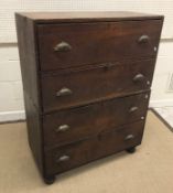 A 19th Century teak chest in two parts, each with two long drawers and replacement brass cup