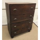 A 19th Century teak chest in two parts, each with two long drawers and replacement brass cup