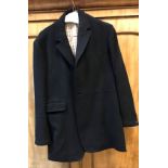 A gentlemen's blue hunt coat with VWH buttons (one missing)Condition ReportThe length of the coat is