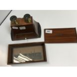 A Carpenter & Westley stereoscope, Brewster pattern, with one slide 16 cm