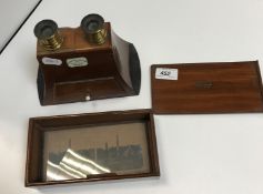 A Carpenter & Westley stereoscope, Brewster pattern, with one slide 16 cm