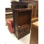 A modern mahogany bookcase cabinet with three glaz