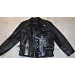 A cowhide leather motorcycle jacket with hand painted decoration depicting various Iron Maiden Eddie