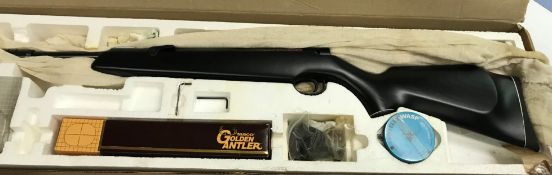 A Webley & Scott "Webley Tracker" .22 air rifle, boxed, together with various accessories