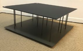 A Ligne Roset two tier coffee/book table, the ebon