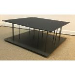 A Ligne Roset two tier coffee/book table, the ebon