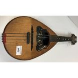 An Italian mandolin by Michele Meglio of Napoli with label to interior and stamp to the pine front