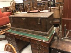 An 18th Century oak coffer the two plank top with