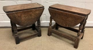 Two 20th Century oak oval drop-leaf occasional tables on turned and ringed legs to block feet united