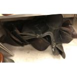 A collection of seven various general purpose leather saddles