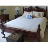 A modern mahogany double bedstead in the Rococo style, 173 cm wide x 222 cm long