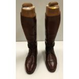 A pair of early 20th Century gentlemen's brown leather part laced hunting boots with trees inscribed