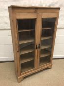 A pine three tier dumb waiter in the Victorian style, 92.5 cm wide x 38 cm deep x 95 cm high, a pine