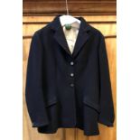 A blue hunt coat by Bernard Wetherill of Conduit Street London with VWH moulded buttons, approx size