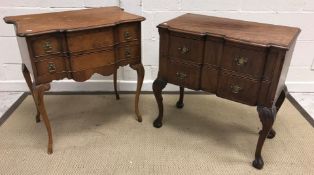A 20th Century walnut two drawer side table in the 18th Century Dutch taste, raised on carved