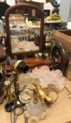 A Victorian mahogany toilet mirror with serpentine base, 58 cm high, a mahogany framed and brass