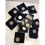A collection of 11 various commemorative two-pound coins,