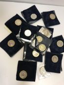 A collection of 11 various commemorative two-pound coins,