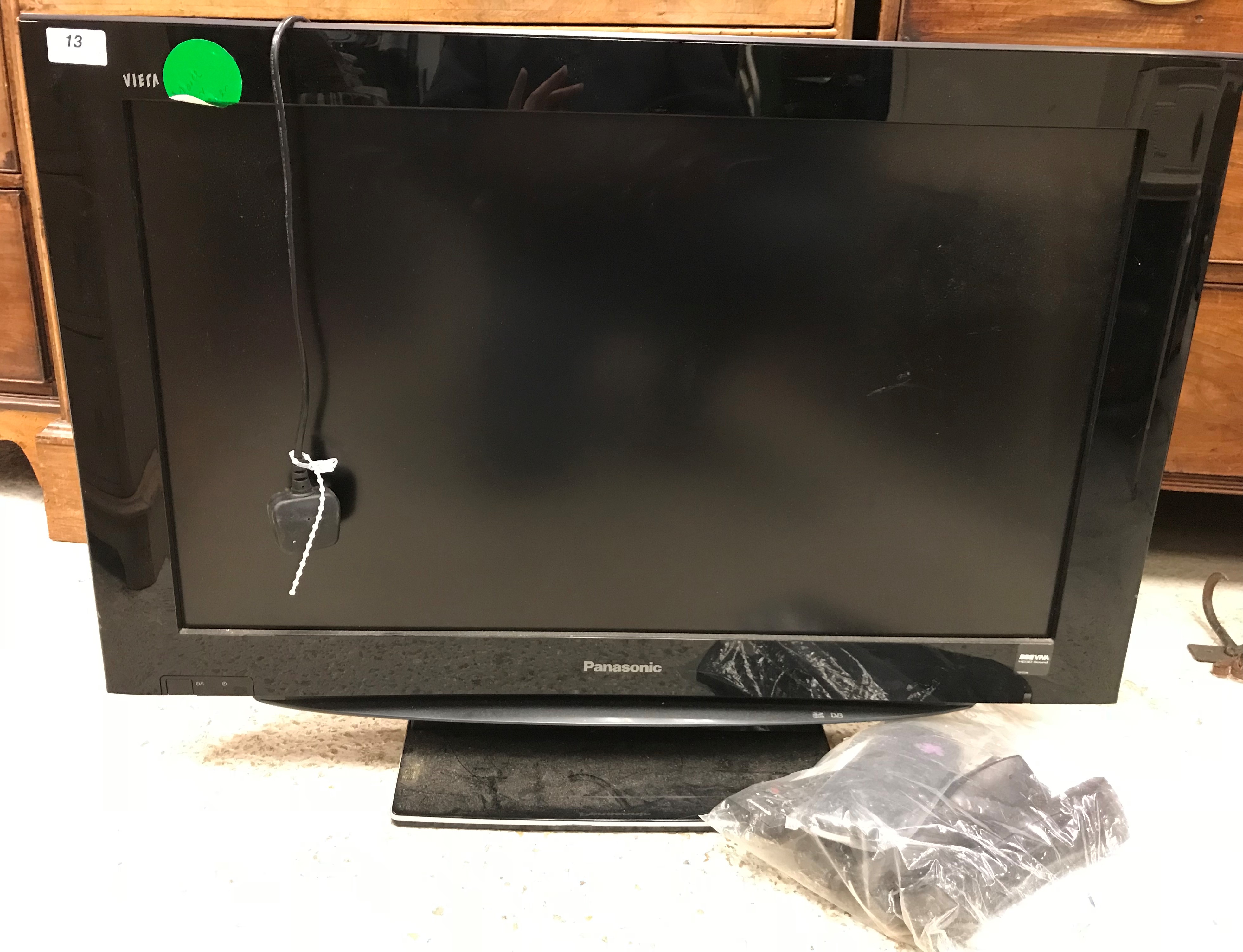 A Panasonic Viera colour television with remote control