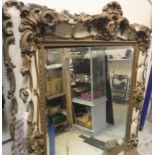 A 19th Century wall mirror with gilt shell,