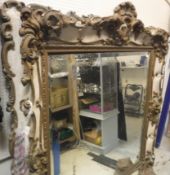 A 19th Century wall mirror with gilt shell,