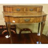 A mid 20th Century walnut side table with two drawer superstructure over a single frieze drawer on