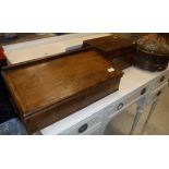 An early 19th Century mahogany and cross-banded table top writing chest with reading slope top